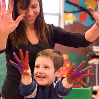 Department of Educational Specialties (ES), teacher and your child finger painting